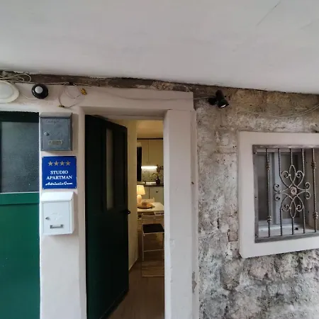 Tiny In Center Stone House