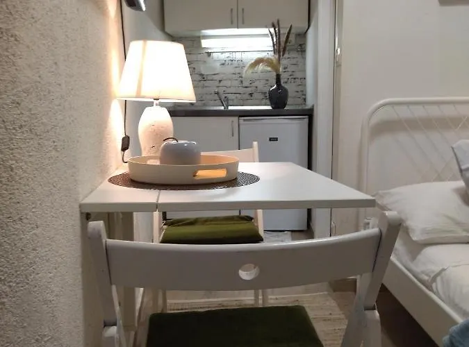 Tiny In Center Stone House *